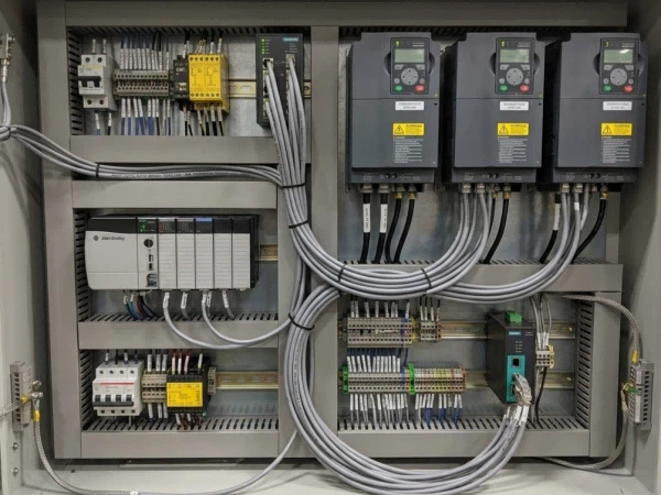 Industrial automation control panel with variable frequency drives (VFD) where FOCC Cat7e S/FTP shielded bulk cable prevents EMI crosstalk and packet loss Industrial automation control panel with variable frequency drives (VFD) where FOCC Cat7e S/FTP shielded bulk cable prevents EMI crosstalk and packet loss